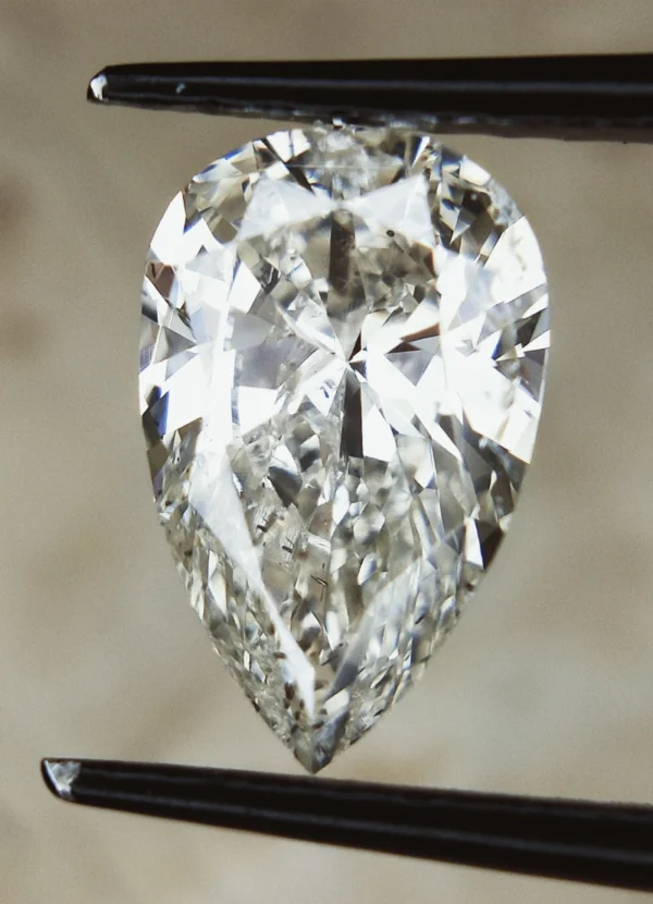 1.03 CTS , Natural Colored Diamond ,Pear Brilliant Cut