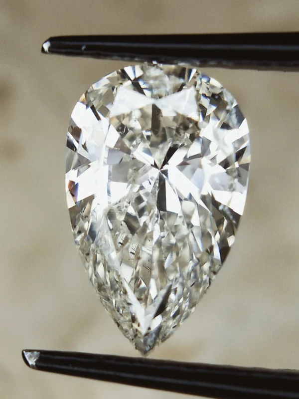 1.03 CTS , Natural Colored Diamond ,Pear Brilliant Cut