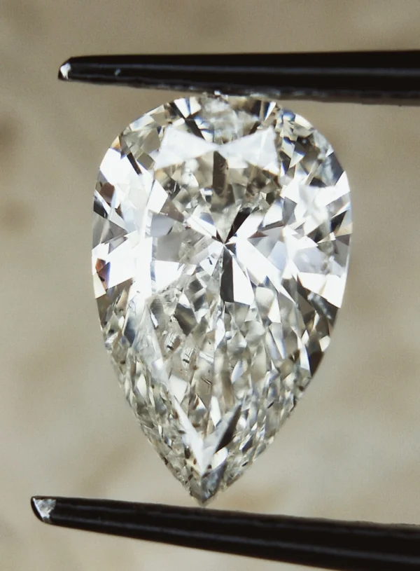 1.03 CTS , Natural Colored Diamond ,Pear Brilliant Cut